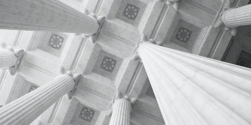 Classical architecture background. Ceiling and columns. 3D rendering.