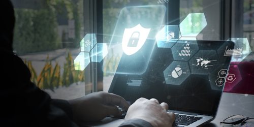 Young women using computer, Cyber security concept.