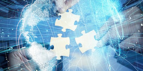 Pieces of jigsaw puzzle and global network concept.