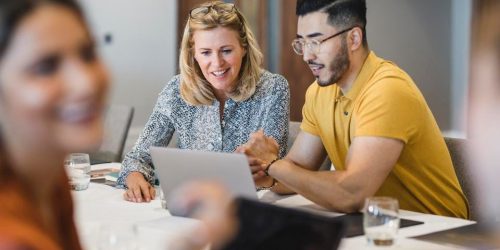 https___specials-images.forbesimg.com_imageserve_602430edc2b2822873ea941e_Hipster-young-man-showing-female-colleague-laptop_960x0